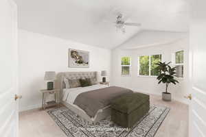 Virtually Staged - Primary Bedroom with light colored carpet, ceiling fan, and vaulted ceiling