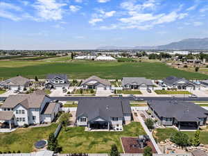 Aerial perspective of suburban area with a mountainous background