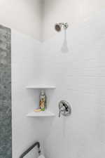 Primary bathroom view of tiled shower. Separate from bath tub