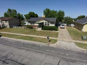Bungalow-style house featuring driveway