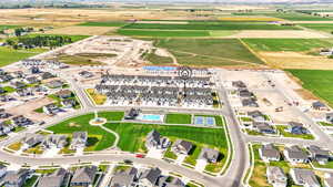 Aerial view of property's location featuring nearby suburban area