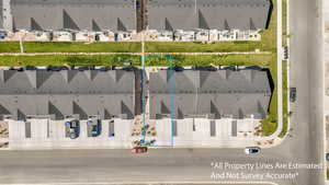 Aerial perspective of suburban area with property parcel outlined