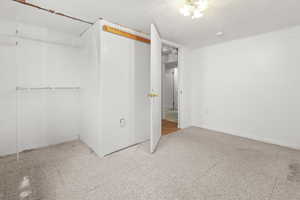 Unfurnished bedroom featuring carpet floors