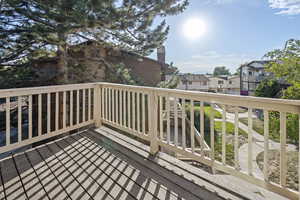 Wooden deck with a residential view