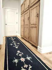 Living area with a textured ceiling and carpet floors