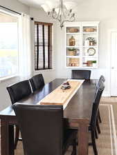 Dining area featuring a chandelier