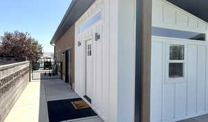 Wooden terrace featuring a mountain view and a view of rural / pastoral area