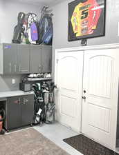 Garage featuring a garage door opener