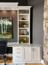 Office featuring light wood-style flooring and baseboards