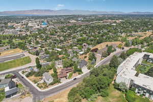 Aerial overview of property's location with a mountainous background