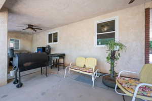 View of patio / terrace featuring ceiling fan