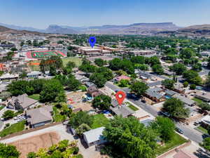 Aerial view of residential area with a mountainous background