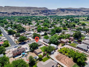 Aerial view of residential area featuring mountains