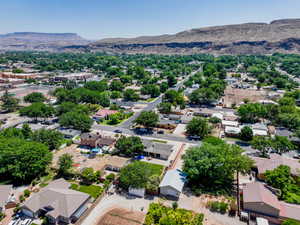 Aerial view of residential area featuring mountains