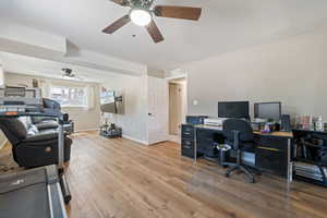 Office featuring ceiling fan and light wood-type flooring