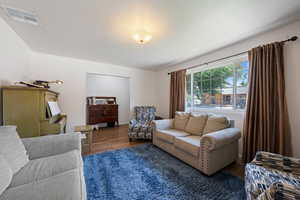 Living area with wood finished floors