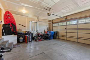Garage featuring a garage door opener