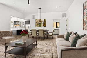 Living room with light wood-type flooring, a chandelier, and recessed lighting
