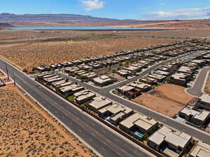 Aerial perspective of suburban area featuring a water and mountain view