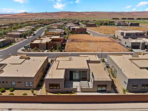 Aerial view of residential area with a mountainous background