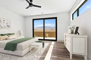 Bedroom featuring access to exterior, wood finished floors, recessed lighting, a mountain view, and ceiling fan