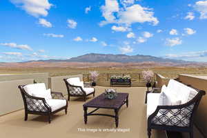 View of patio with a mountain view and an outdoor living space