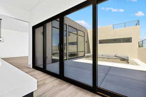 Doorway with wood finished floors