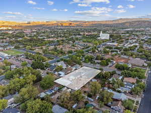 Aerial view of residential area featuring a mountain backdrop