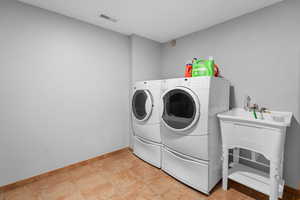 Laundry area featuring washing machine and dryer