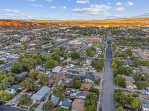 Aerial view of property's location featuring nearby suburban area