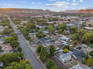 Aerial view of residential area featuring a mountain backdrop