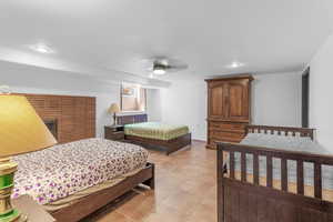 Bedroom with recessed lighting and a ceiling fan