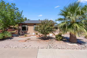 View of front of property featuring a metal roof