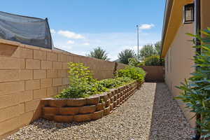 View of fenced backyard