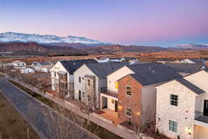 Aerial view of residential area featuring mountains