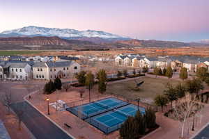 Aerial view at dusk of a residential view and a mountain view