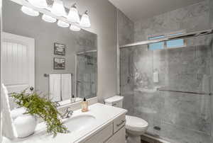 Bathroom 3 featuring vanity and a stall shower