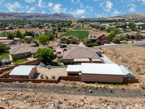 Aerial view of residential area featuring mountains