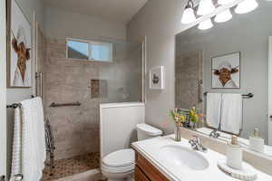 Full bathroom 2 with vanity and walk in shower