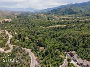 Drone / aerial view of a mountainous background