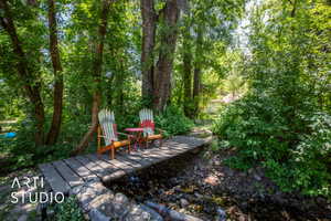 View of yard featuring a wooden deck