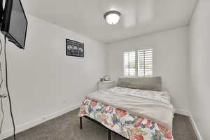 Bedroom with carpet flooring