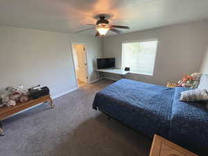 Main Bedroom featuring carpet floors and ceiling fan