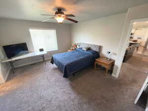Main Bedroom featuring carpet flooring and ceiling fan