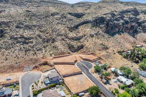 View of property location featuring a mountain backdrop and a desert landscape