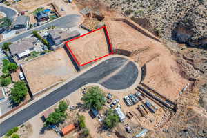 Aerial view of property's location with property parcel outlined and a desert landscape