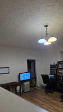 Office space featuring wood finished floors