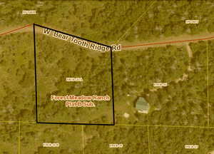 Aerial view of property's location with property parcel outlined
