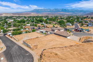 Aerial view of residential area featuring mountains