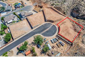 Aerial view of property and surrounding area featuring property boundaries highlighted